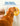 Dog licking Pick & Lick during grooming for calmer moments